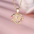 Necklace with heart and flower initial pendant m