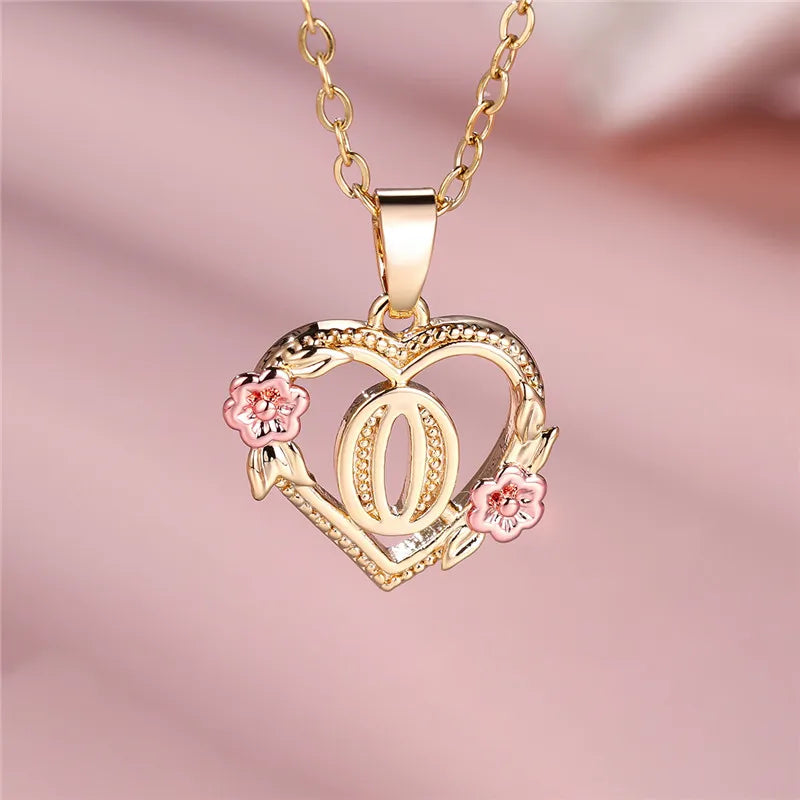 Necklace with heart and flower initial pendant o