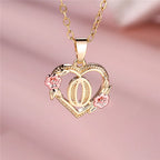 Necklace with heart and flower initial pendant o