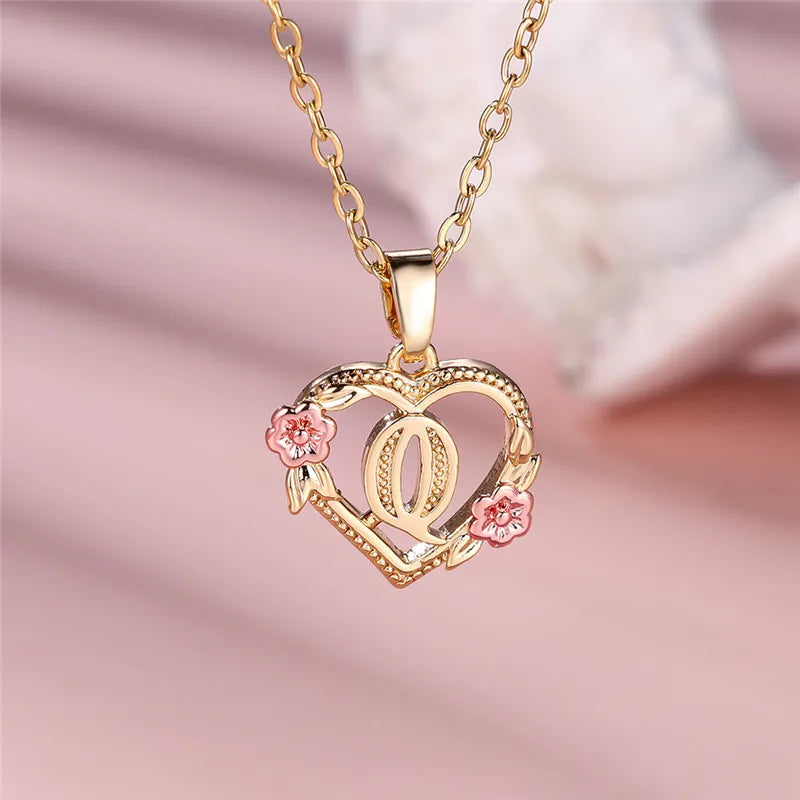 Necklace with heart and flower initial pendant q