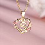 Necklace with heart and flower initial pendant s