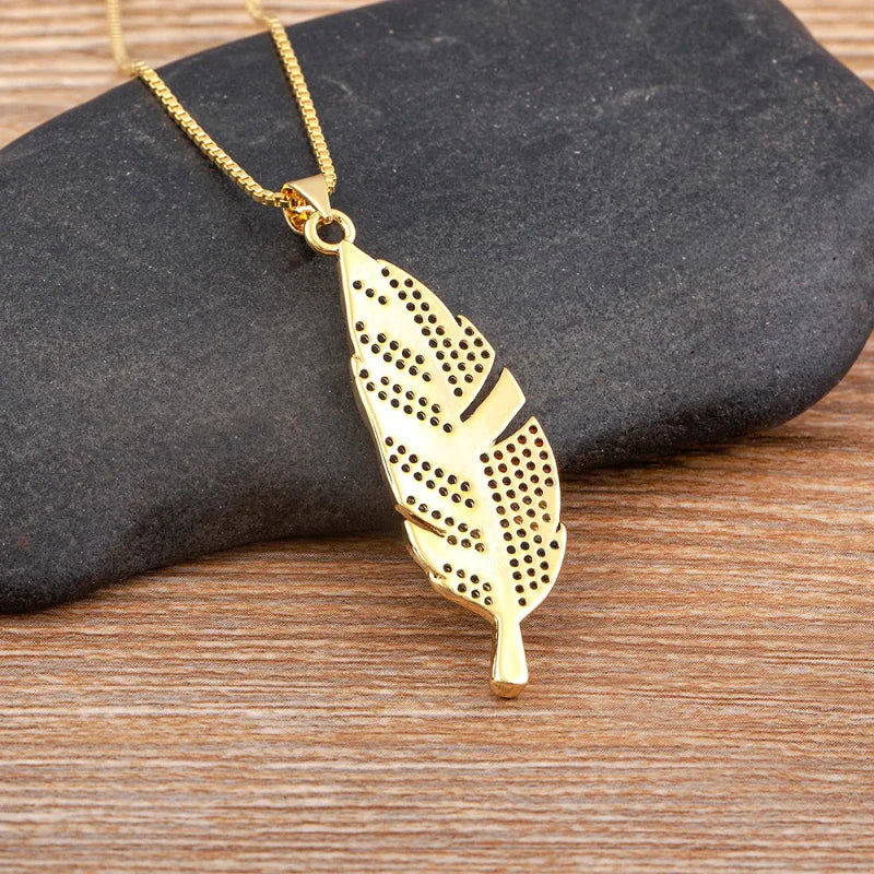 Necklace with Feather and Zircon Pendant