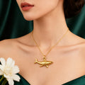 Necklace with gold shark pendant
