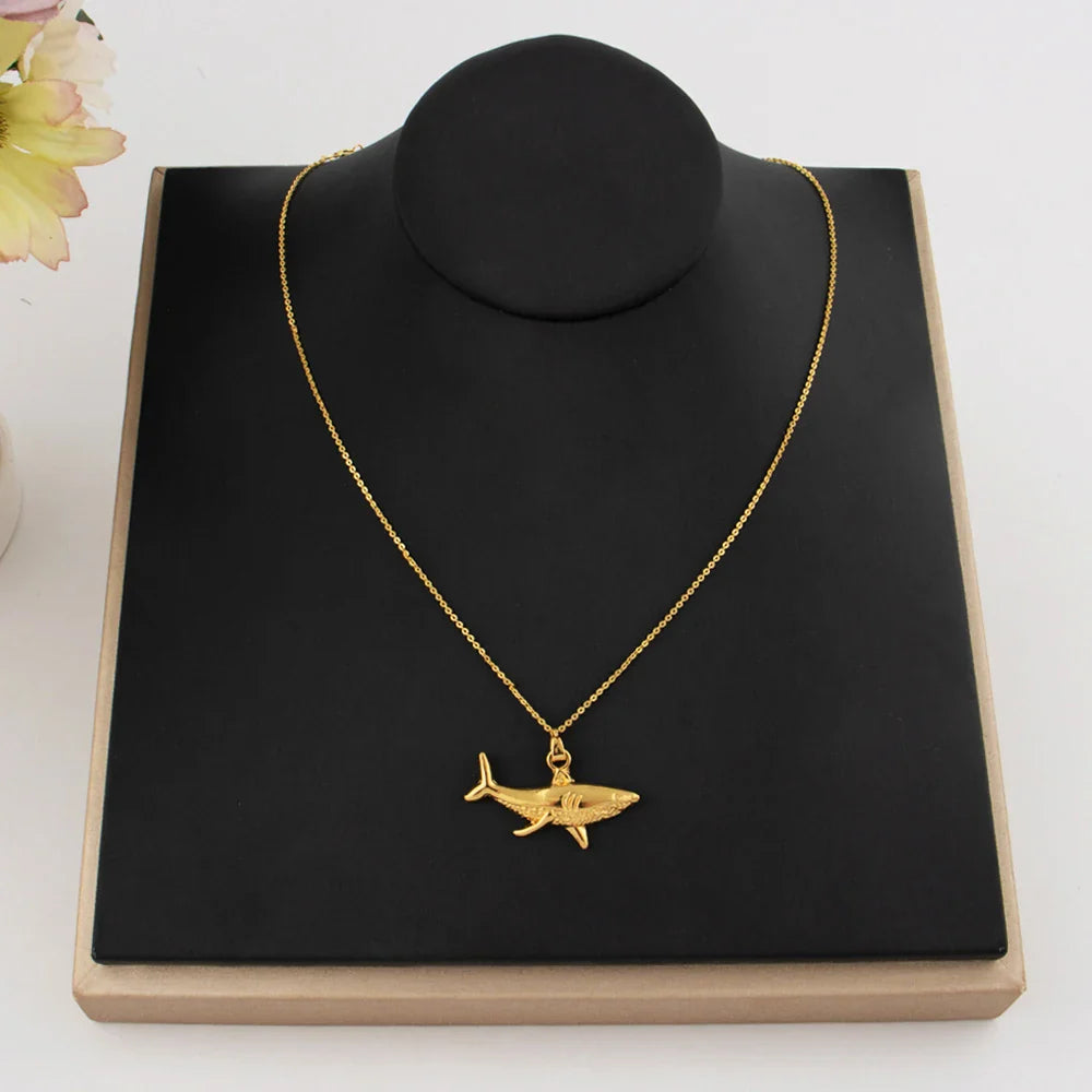 Necklace with gold shark pendant