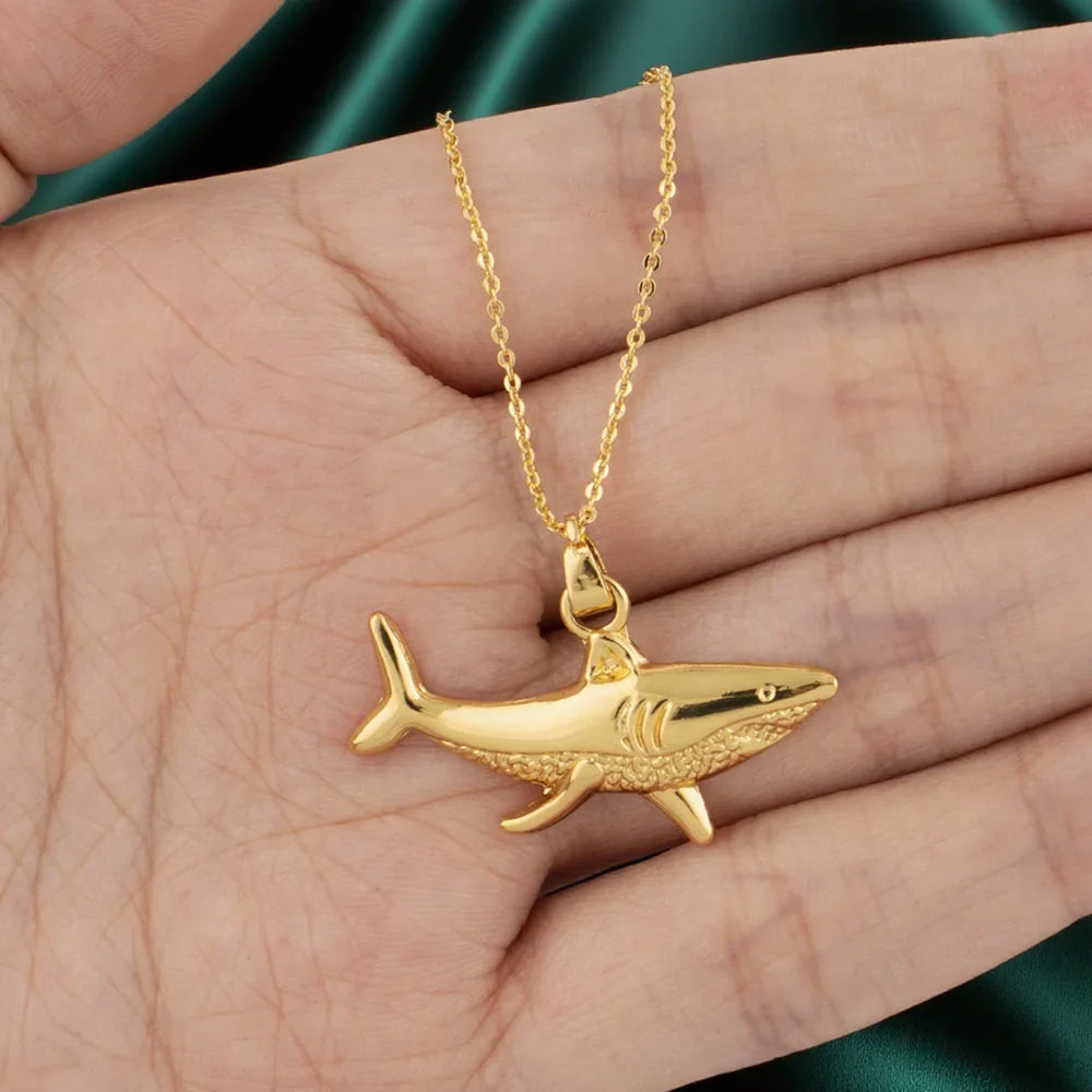 Necklace with gold shark pendant