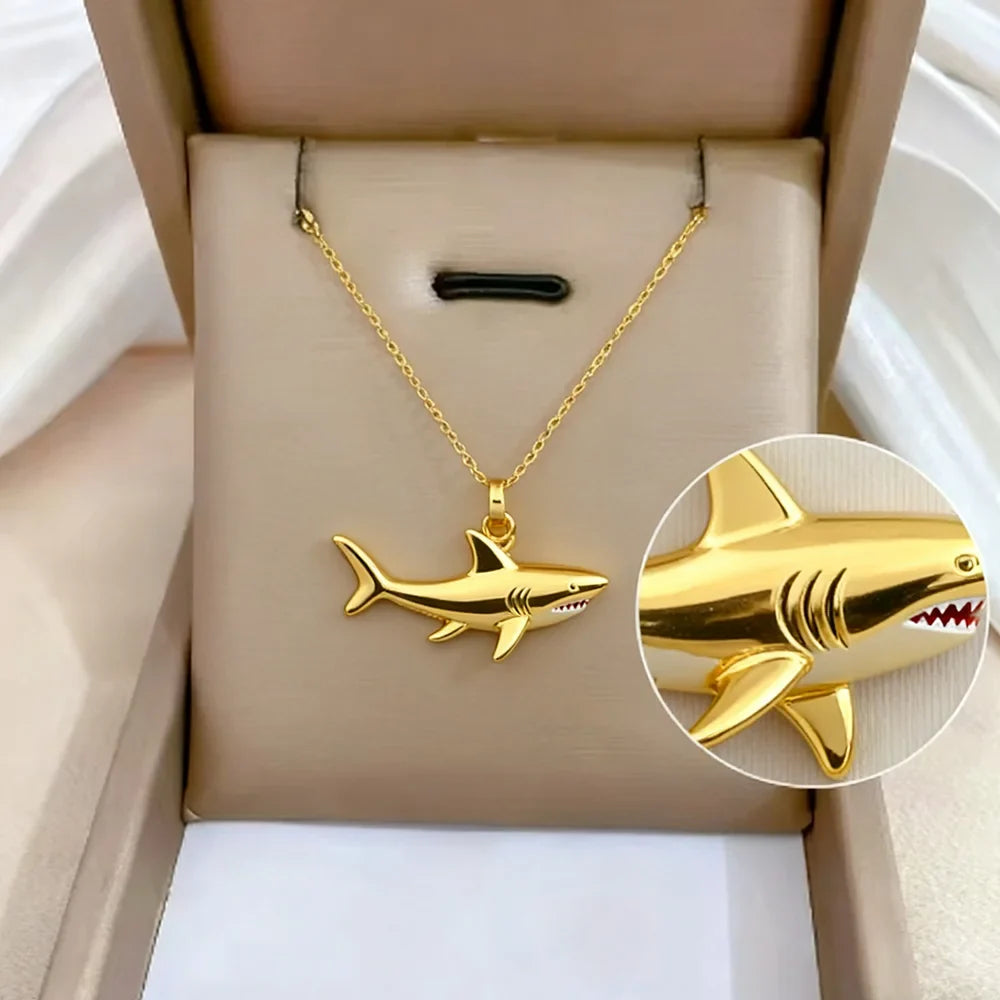 Necklace with gold shark pendant