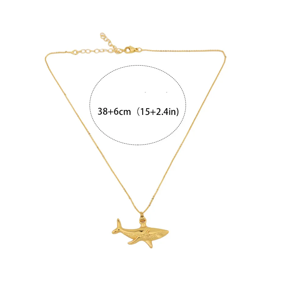Necklace with gold shark pendant
