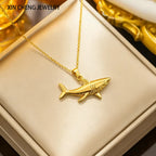 Necklace with gold shark pendant