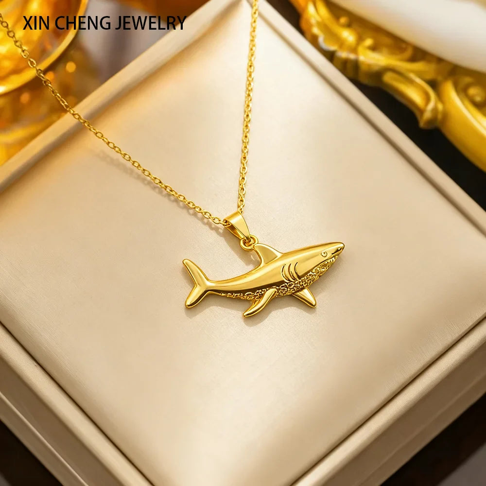Necklace with gold shark pendant