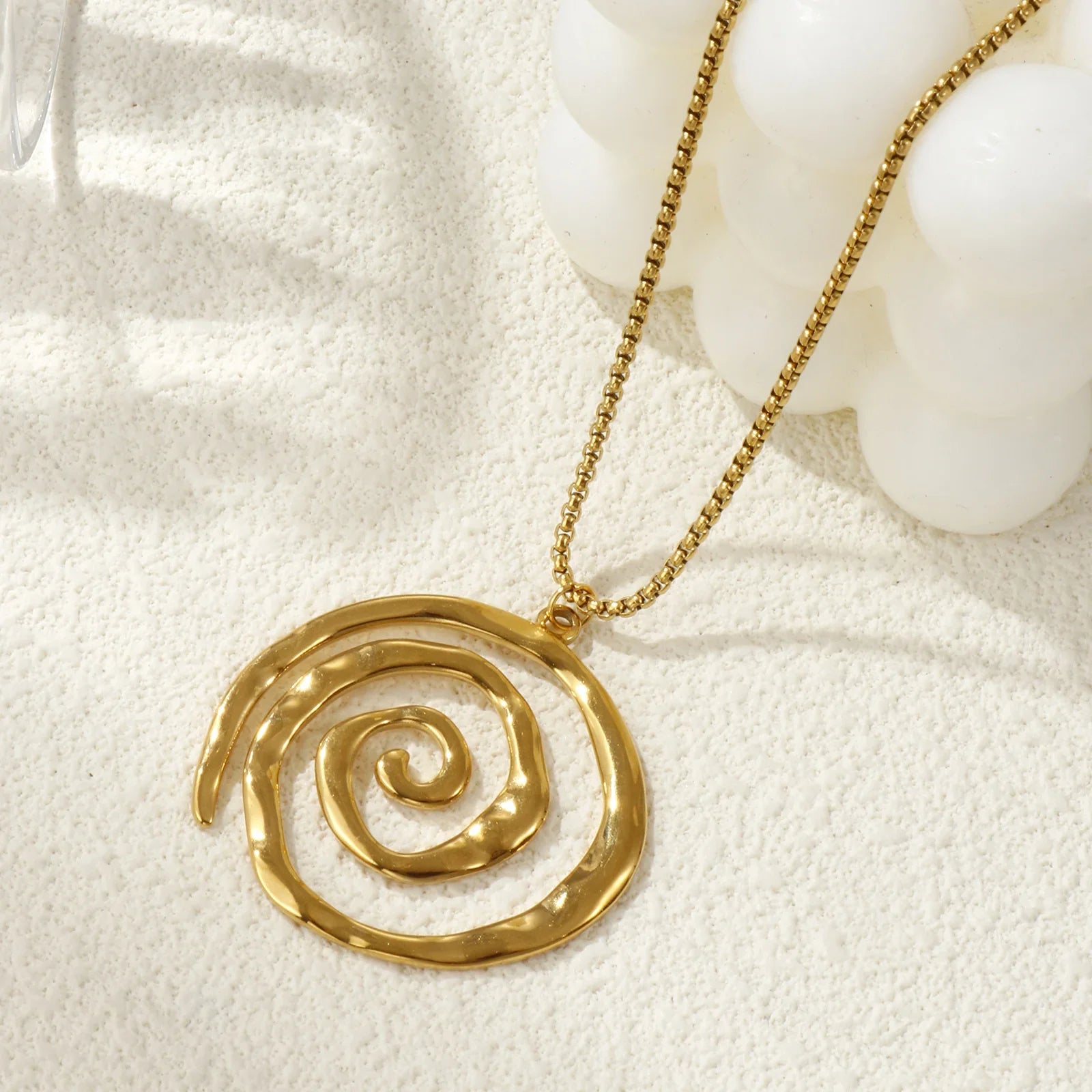 Gold spiral pendant necklace