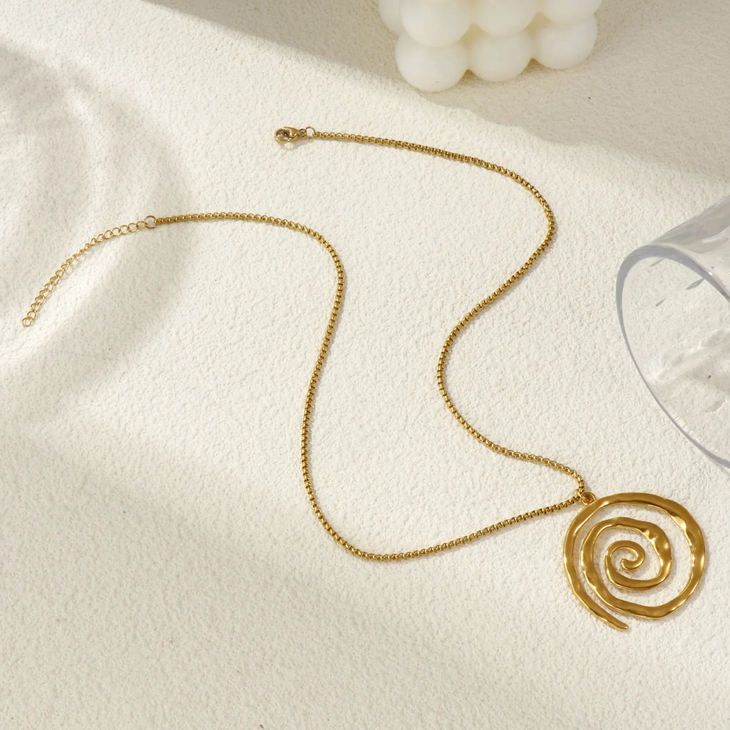 Gold spiral pendant necklace