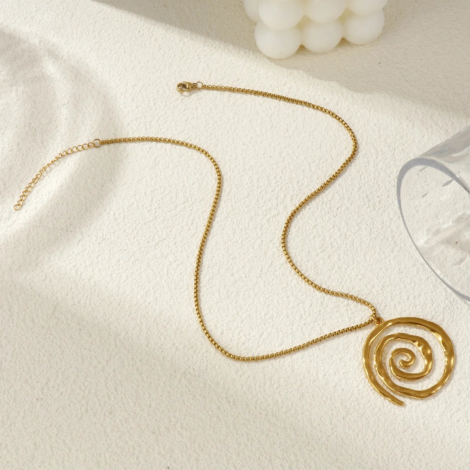 Gold spiral pendant necklace