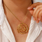 Gold spiral pendant necklace