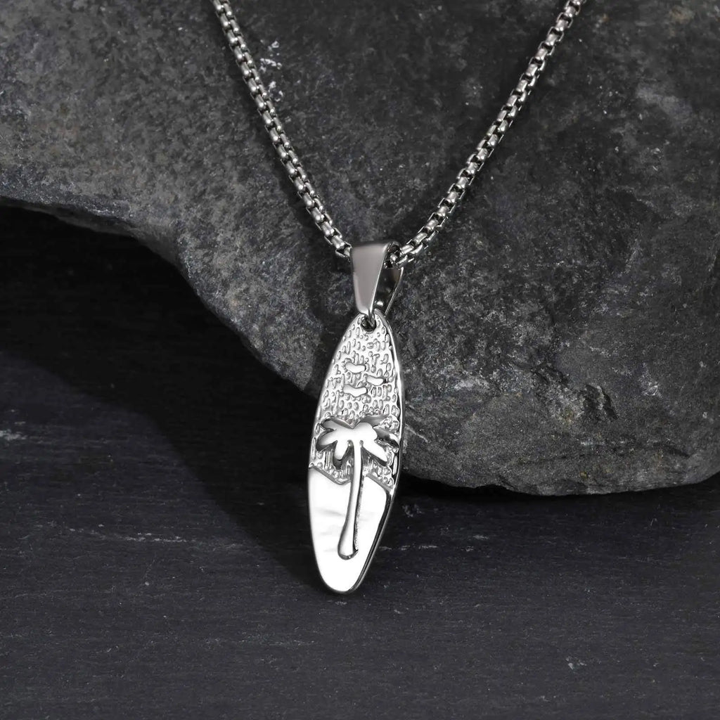 Necklace with small palm tree and sea pendant in silver