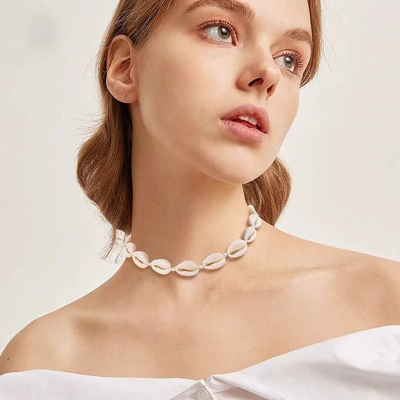 White and white cowrie shell necklace