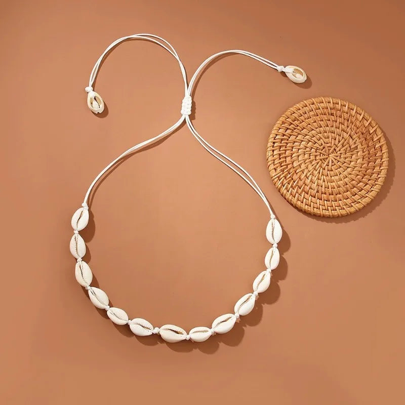 White and white cowrie shell necklace
