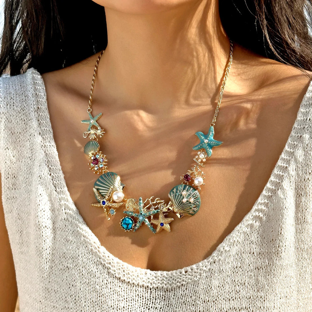 Gold and blue seashell necklace