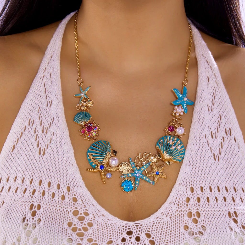 Gold and blue seashell necklace