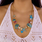 Gold and blue seashell necklace