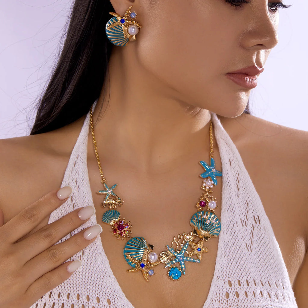 Gold and blue seashell necklace