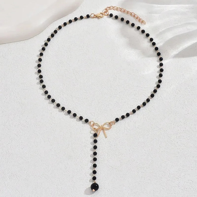Pearl Necklace with Knot Pendant