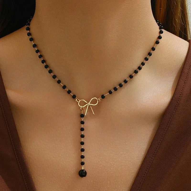 Pearl Necklace with Black Bow Pendant
