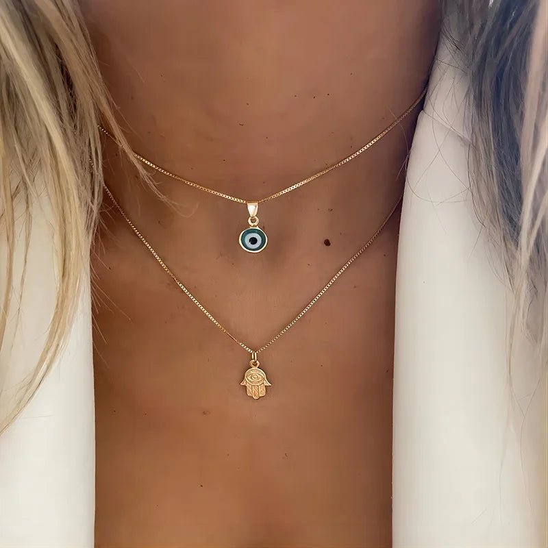 Double Necklace with Blue Turkish Eye and Fatima Hand Pendant Gold