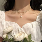 Elegant Double Necklace with Pearl Pendant in gold