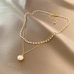 Elegant Double Necklace with Pearl Pendant in gold