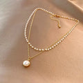 Elegant Double Necklace with Pearl Pendant in gold