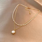 Elegant Double Necklace with Pearl Pendant in gold
