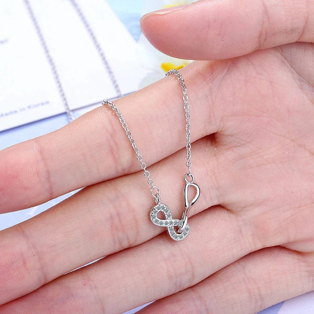 Double Infinity Pendant and Zircon Necklace, Silver