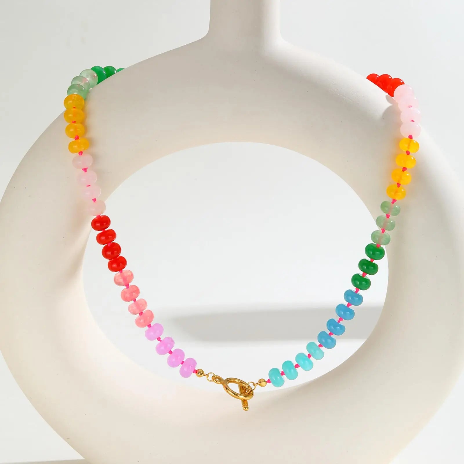 Necklace with rainbow pendant and pearls