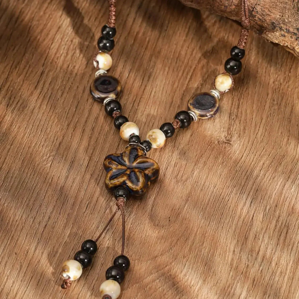 Beaded Necklace with Brown Flower Pendant