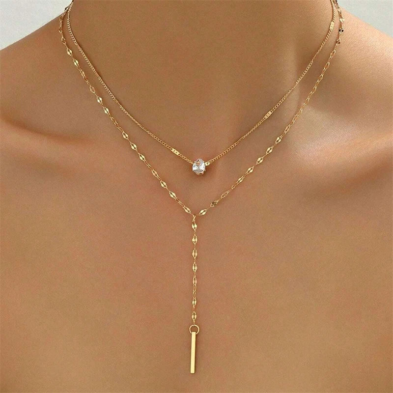 Y necklace - gold-tone décolleté chain for women