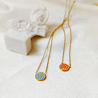 Necklace and pendant with small round birthstone