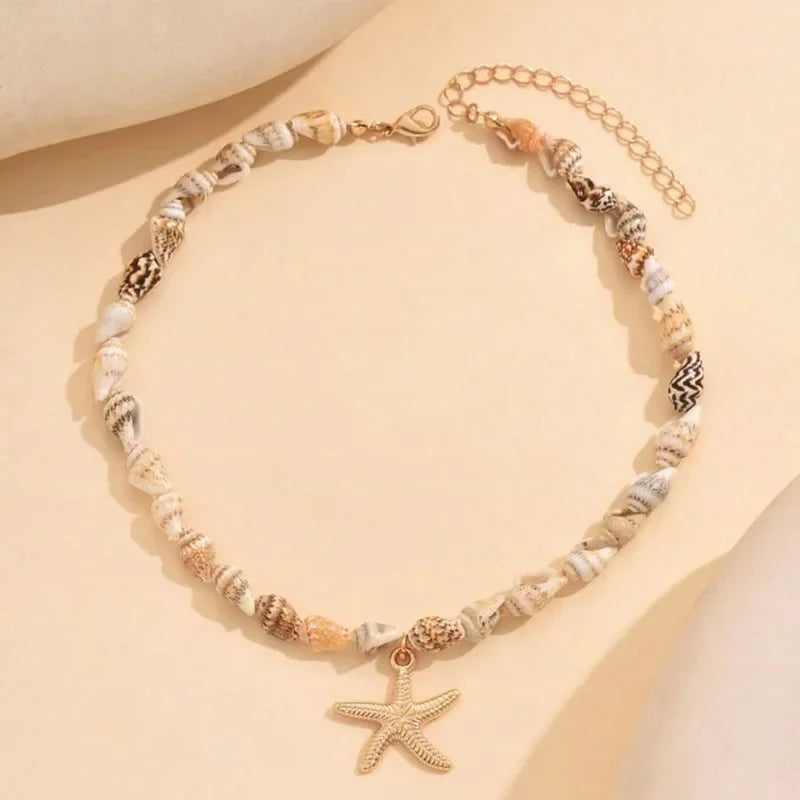 Necklace and shell and starfish pendant