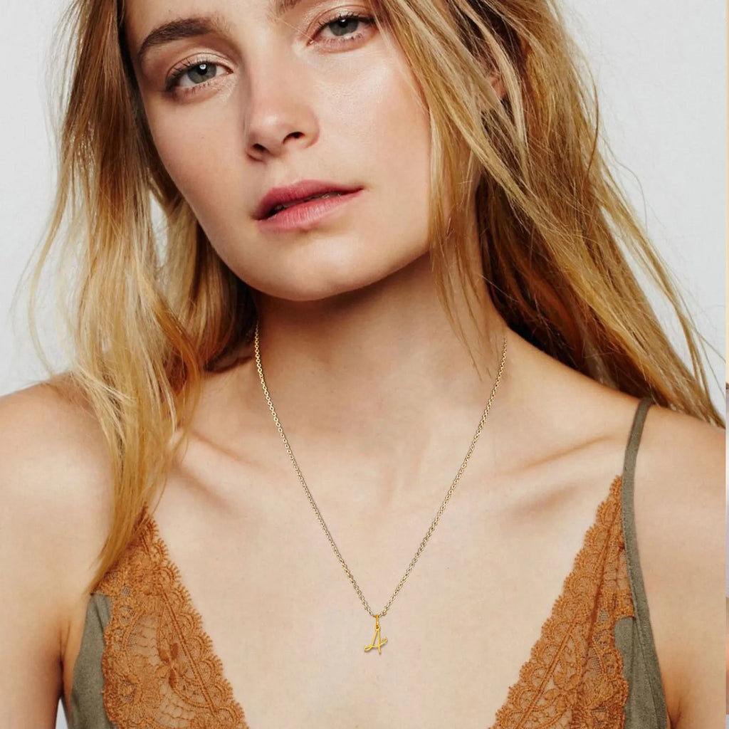 Women's necklace with letter initial pendant and heart