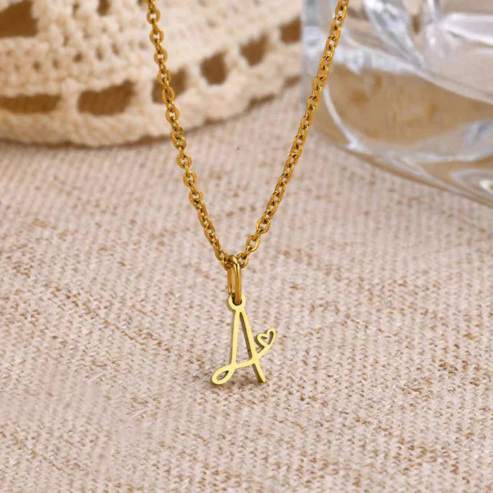 Women's necklace with letter initial pendant and heart 