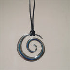 Long necklace with silver spiral pendant