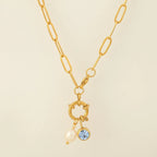 Link necklace with pearl pendant and April birthstone