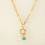 Link necklace with pearl pendant and December birthstone