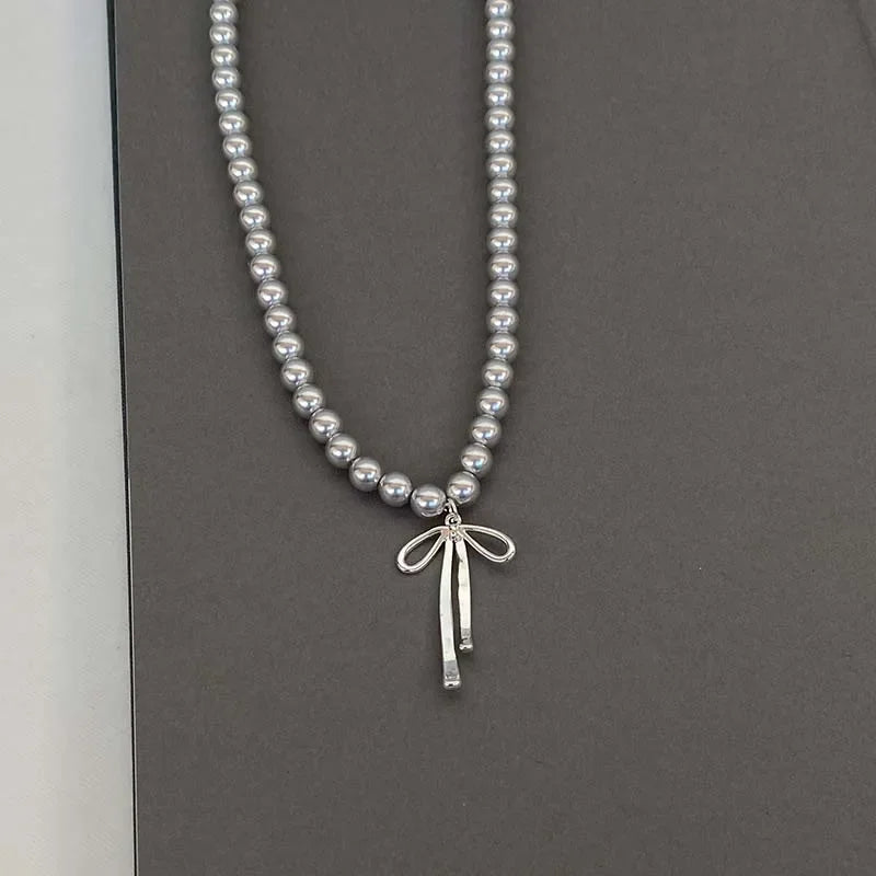 Pendant Necklace with Gray Pearls and Bow Tie 