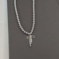 Pendant Necklace with Gray Pearls and Bow Tie 