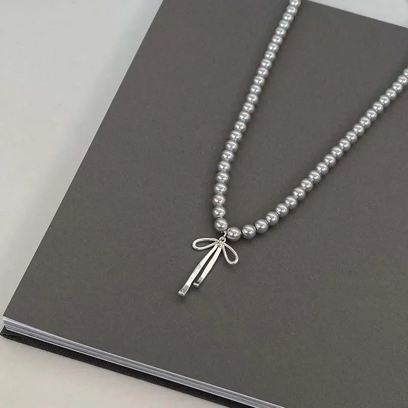 Pendant Necklace with Gray Pearls and Bow Tie 