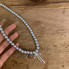 Pendant Necklace with Gray Pearls and Bow Tie 