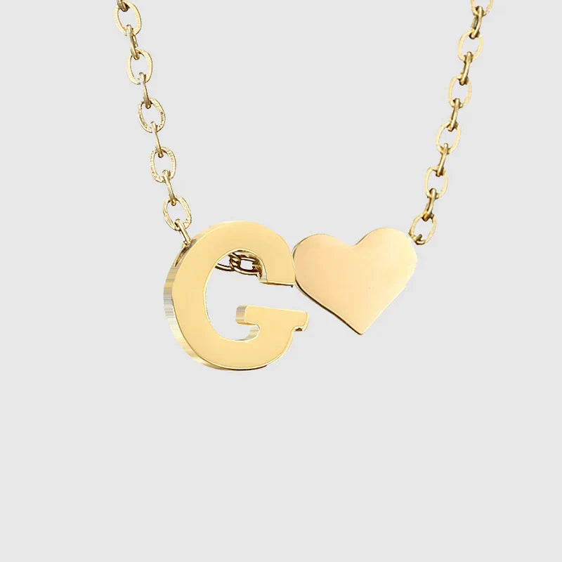 Women's necklace with heart pendant and initial - letter