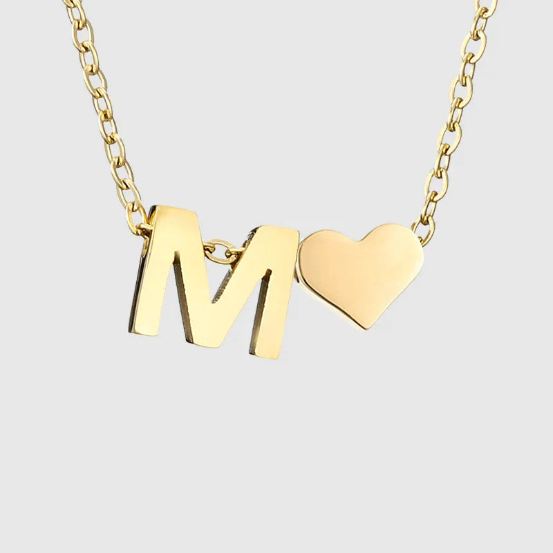 Women's necklace with heart pendant and initial - letter