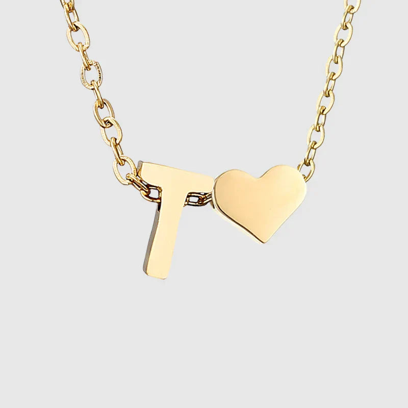 Women's necklace with heart pendant and initial - letter