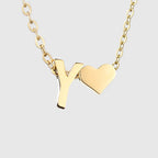 Women's necklace with heart pendant and initial - letter